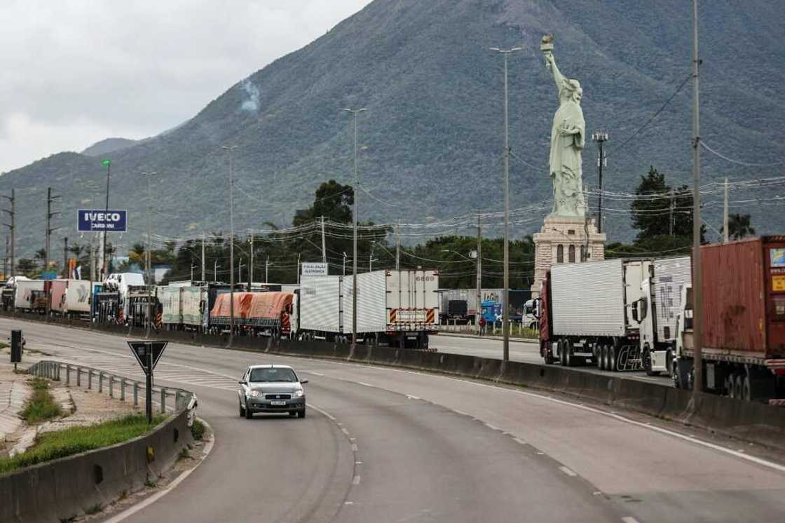 Supporters of President Jair Bolsonaro, mainly truck drivers, erect a replica Statue of Liberty as they block the BR-101 highway in Palhoca, in the metropolitan region of Florianopolis Supporters of President Jair Bolsonaro, mainly truck drivers, erect a replica Statue of Liberty as they block the BR-101 highway in Palhoca, in the metropolitan region of Florianopolis