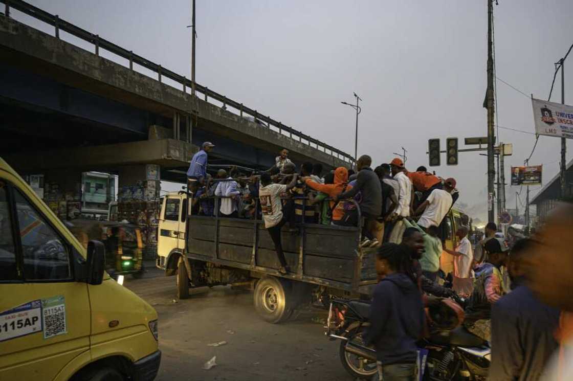 People struggle to get into Kinshasa for work because of the chaos on its roads and lack of public transport