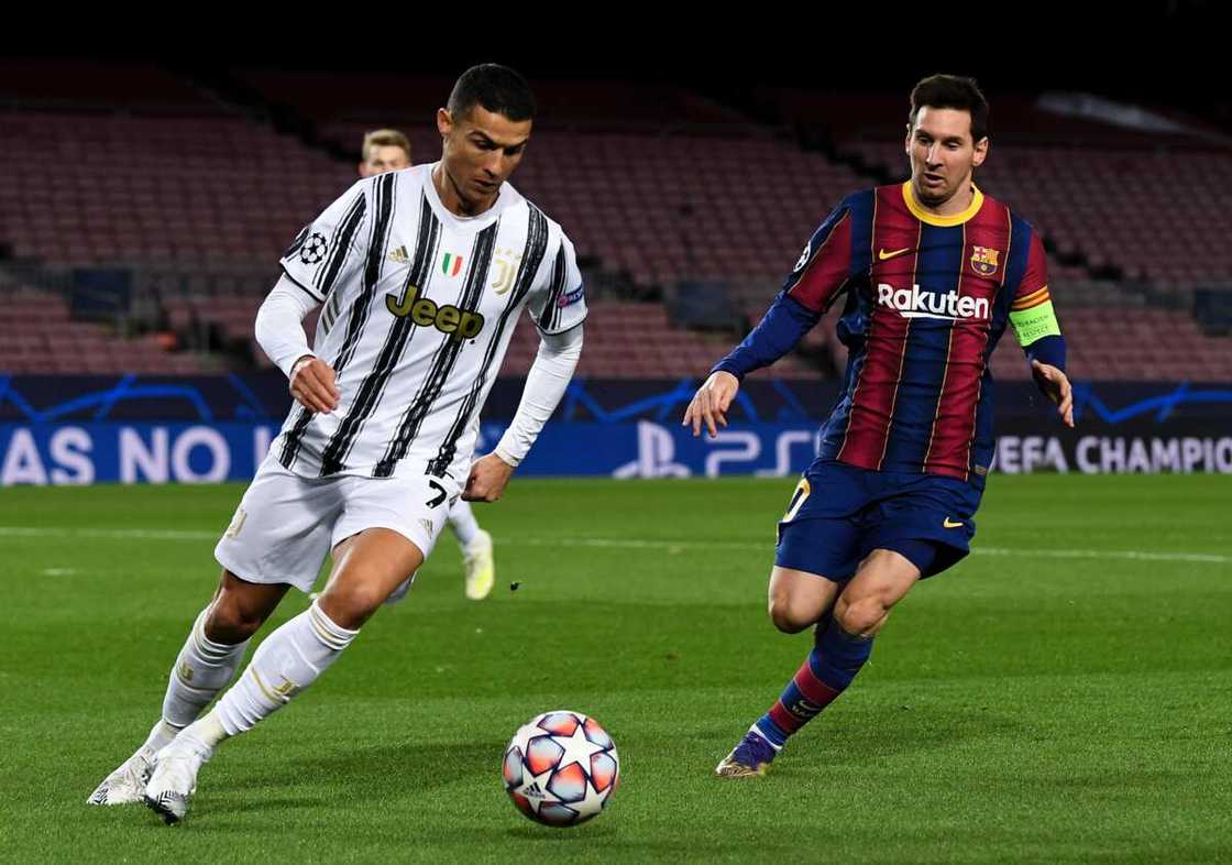 Cristiano Ronaldo and Lionel Messi in action Cristiano Ronaldo and Lionel Messi in action