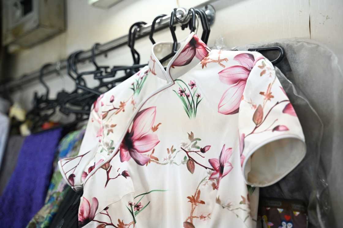 With about 10 more dresses to finish, Yan Kar-man hesitated to give an exact closing day for his tiny workshop in a bustling Hong Kong commercial district With about 10 more dresses to finish, Yan Kar-man hesitated to give an exact closing day for his tiny workshop in a bustling Hong Kong commercial district