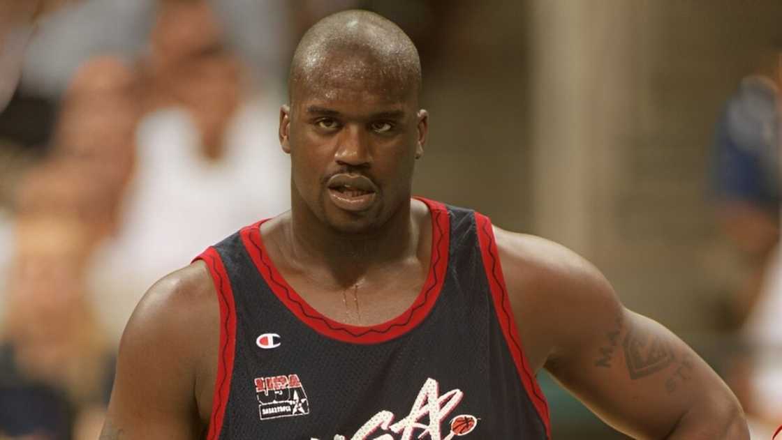 Shaquille O'Neal pictured standing on a basketball court.