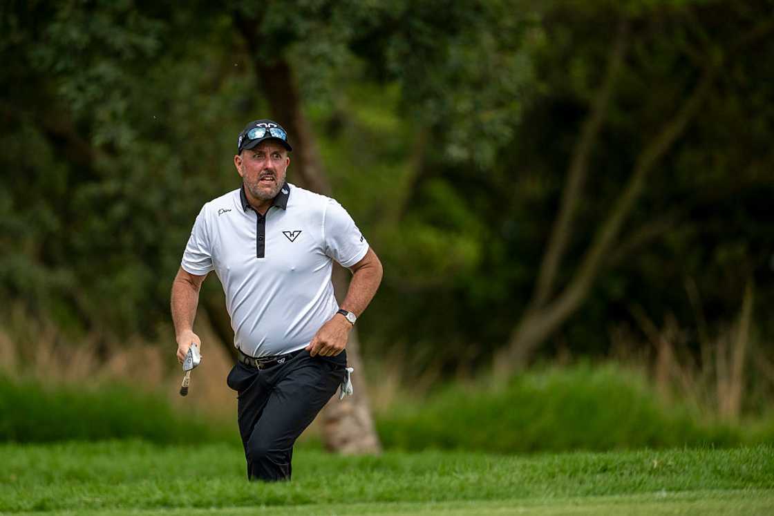 Phil Mickelson plays a bunker shot on the fourth hole during day two of LIV Golf South Africa