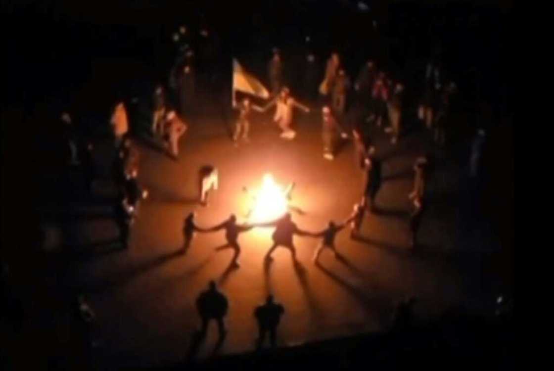 Ukrainians in Kherson danced around a bonfire in darkness and sang 'Chervona Kalyna', a patriotic song