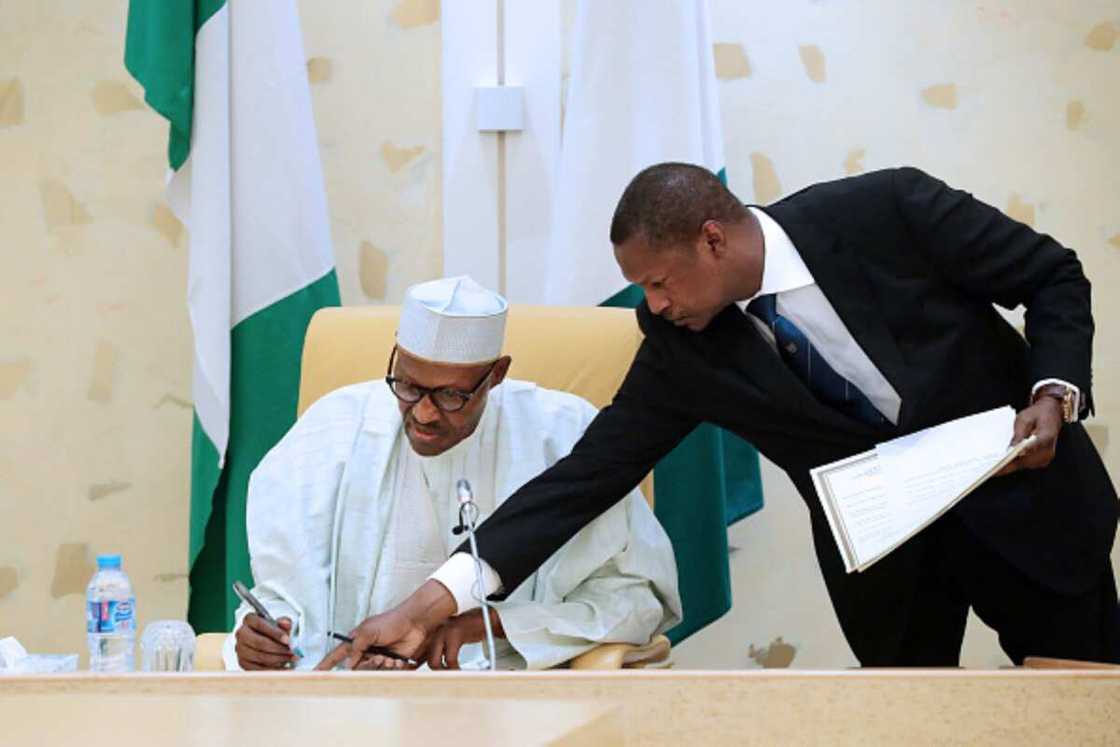 Buhari and Malami Buhari and Malami