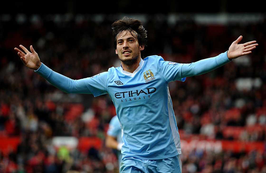 David Silva celebrates scoring his team's fifth goal during the Barclays Premier League