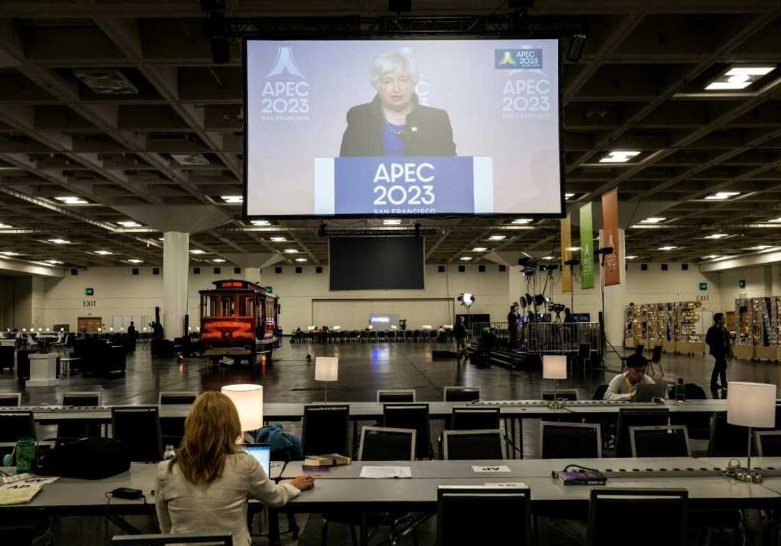 US Treasury Secretary Janet Yellen is seen on a screen as she speaks during a press conference in the Moscone Convention Center at the APEC summit in San Francisco