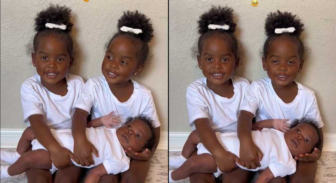 Photos of a set of twins holding their younger brother. Photos of a set of twins holding their younger brother.
