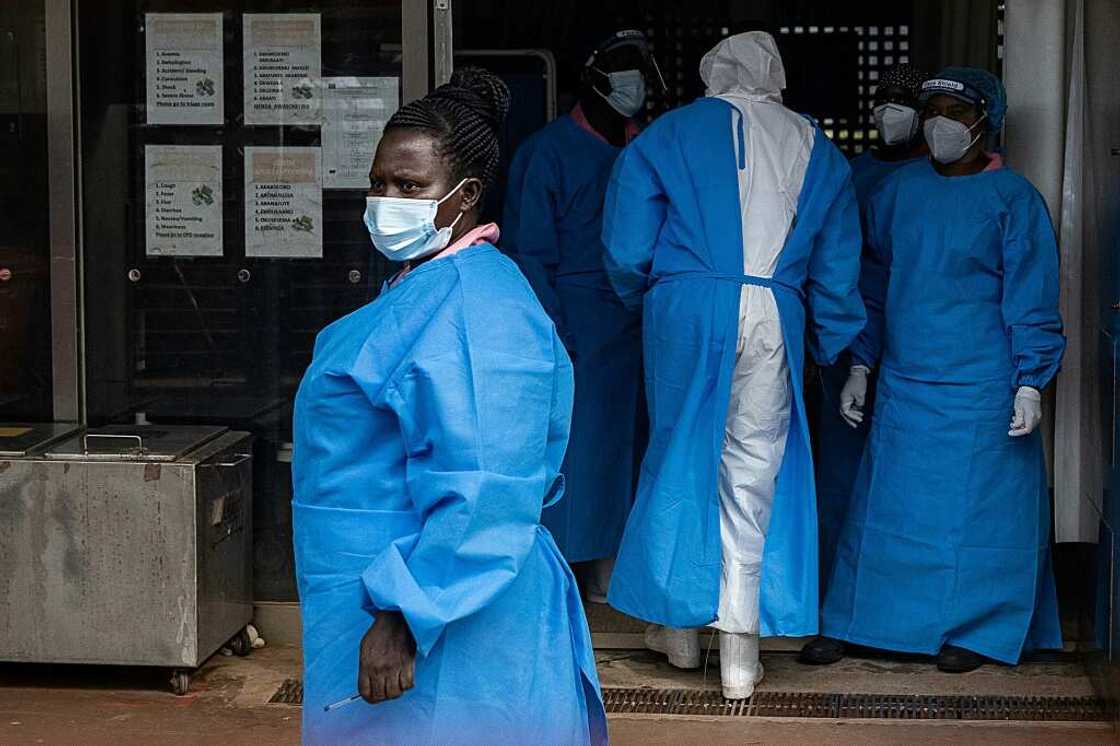 Ugandan medical staff treating Ebola patients at Mubende Regional Referral Hospital last month. Ugandan medical staff treating Ebola patients at Mubende Regional Referral Hospital last month.