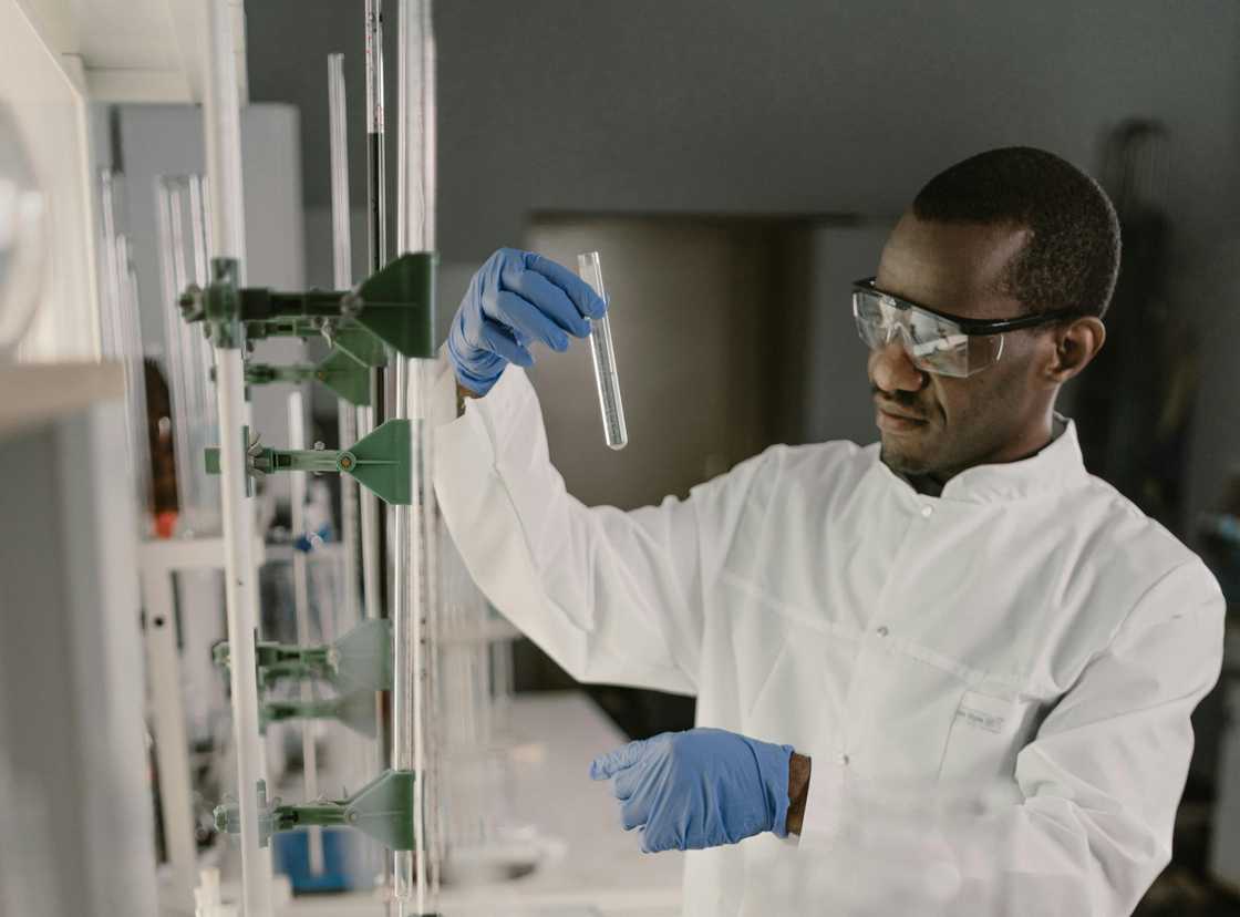 A researcher in a laboratory conducting research A researcher in a laboratory conducting research