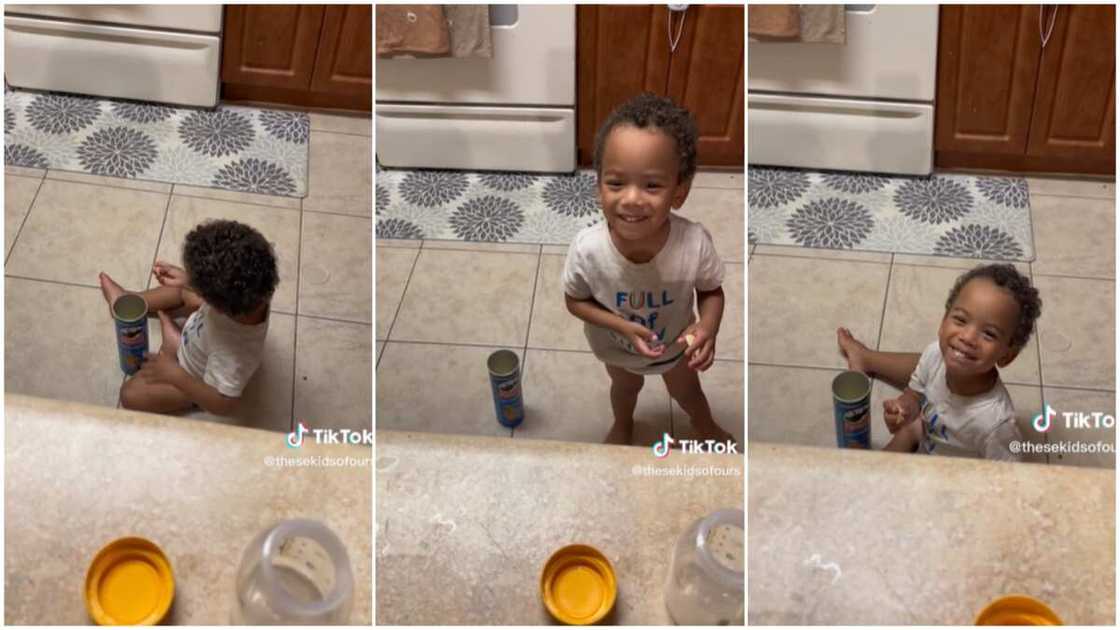 Kid inside kitchen/father caught son eating. Kid inside kitchen/father caught son eating.