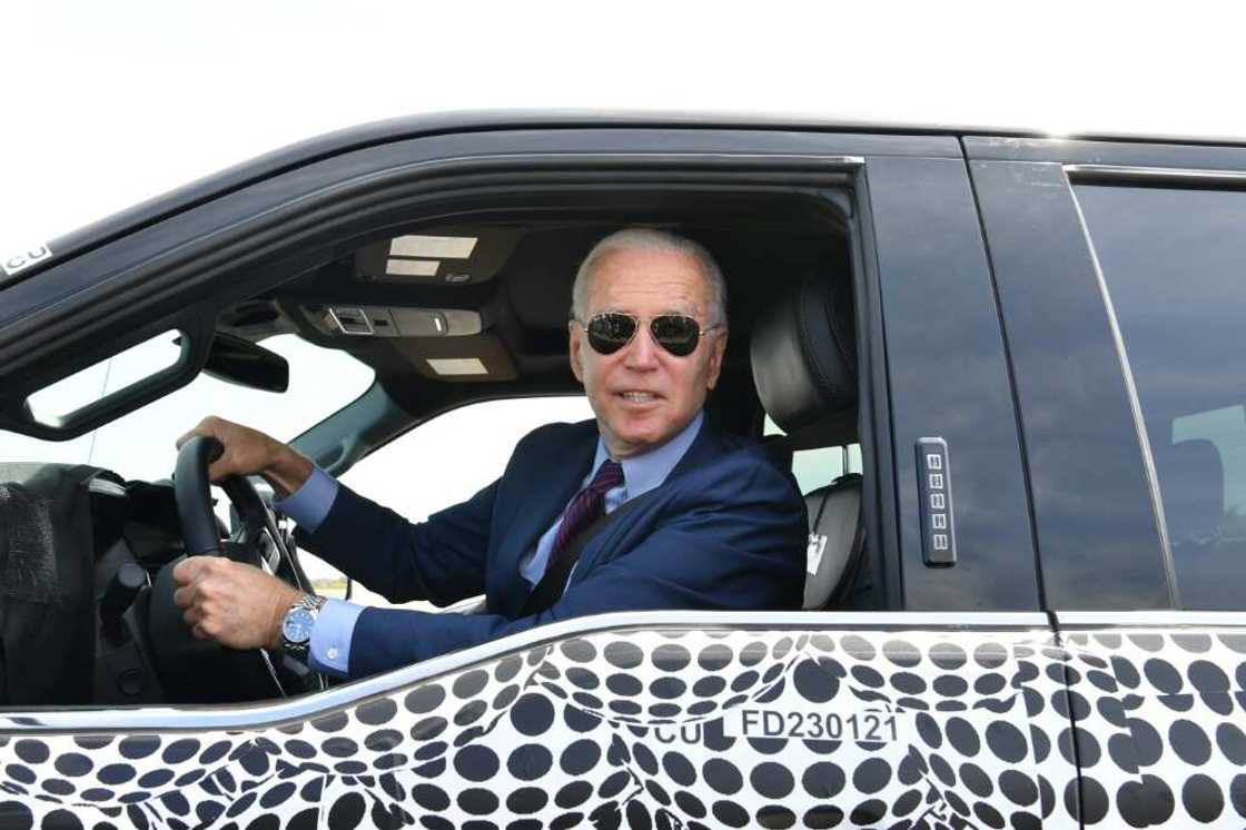 US President Joe Biden, seen here in May driving the new electric Ford F-150 Lightning, will be back in Detroit this week for the first Detroit Auto Show since the pandemic