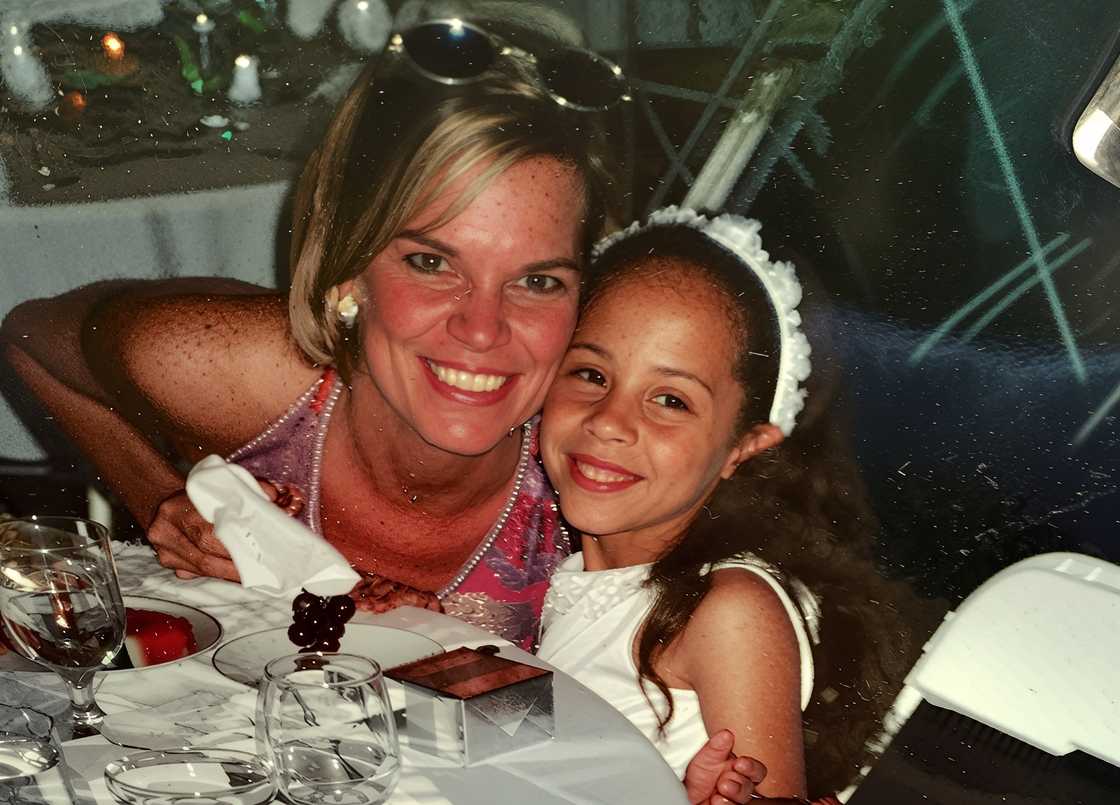 Madison Keys' mother, Christine Keys poses with her hands around her daughter