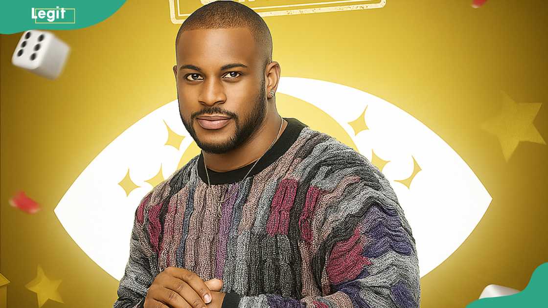 Kaybobo wearing a multicoloured sweater