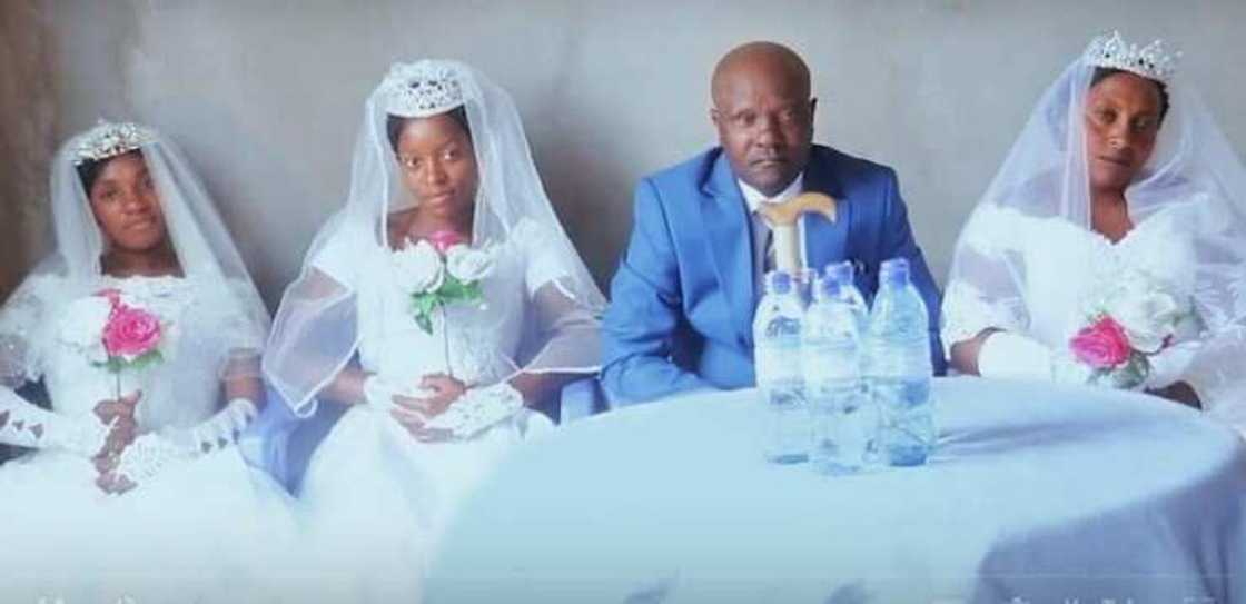 Byamungu Kanjira Prosper and his wives. Byamungu Kanjira Prosper and his wives.