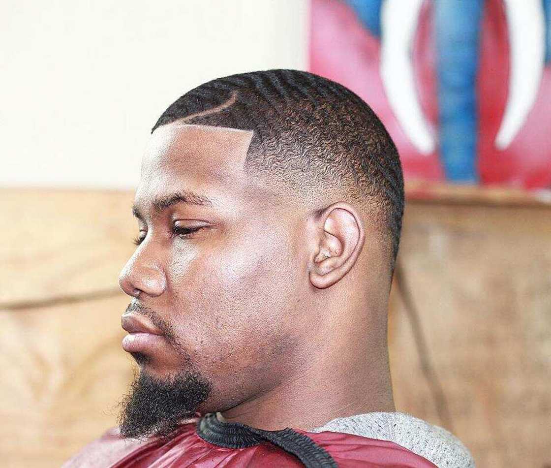 Fade buzz cut with stripe Fade buzz cut with stripe