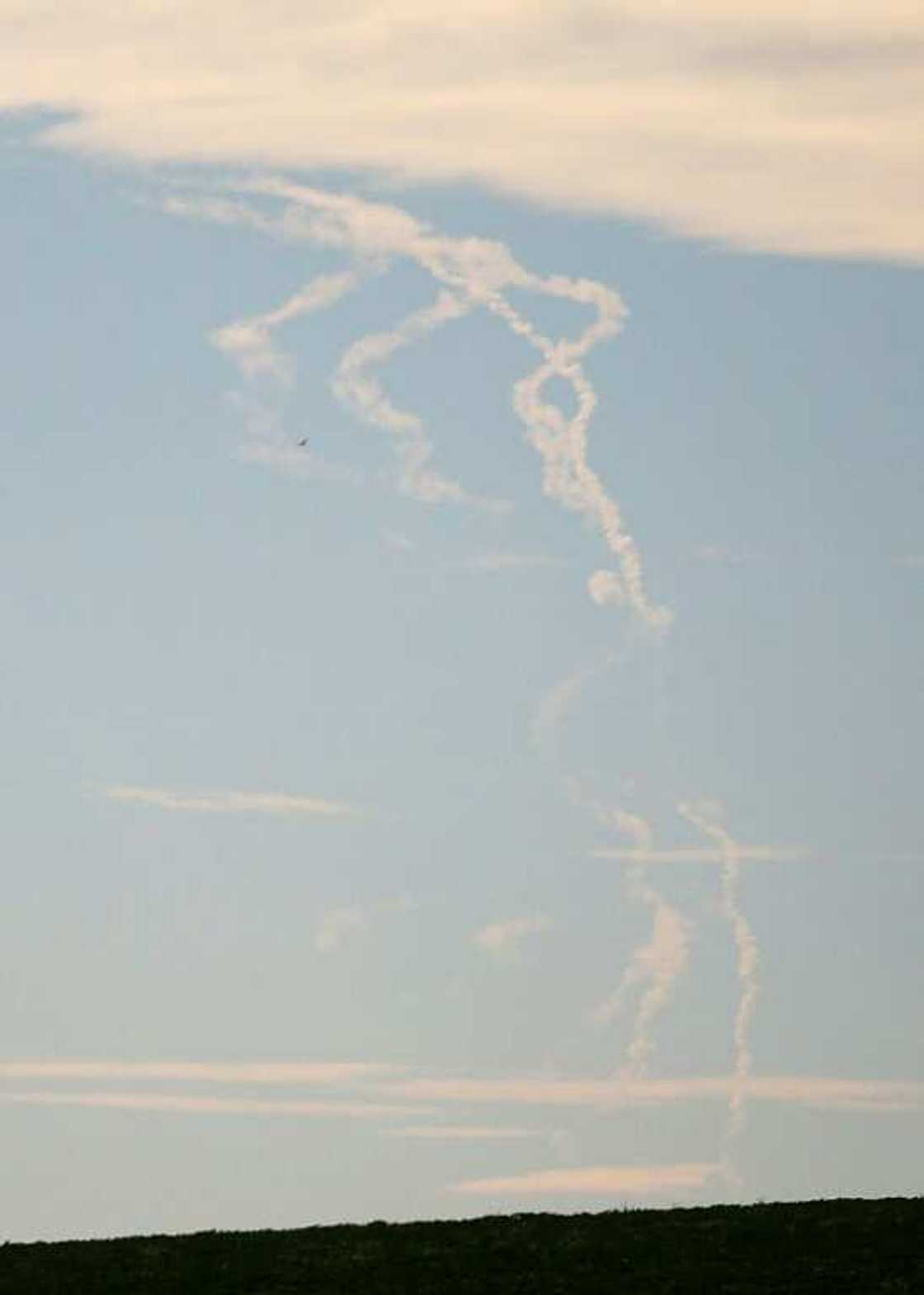 Rockets trails are seen in the sky in Ukraine's eastern Donbas region