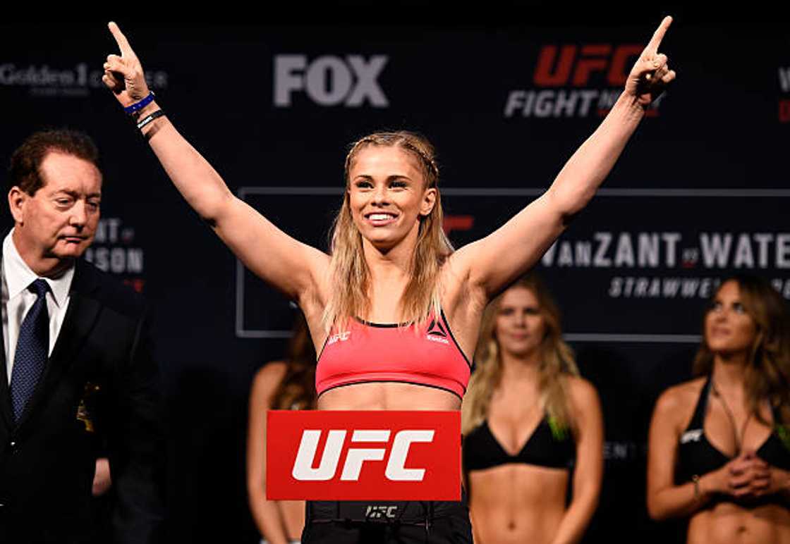Paige VanZant poses on the scale during the UFC Fight Night weigh-in inside the Golden 1 Center Arena