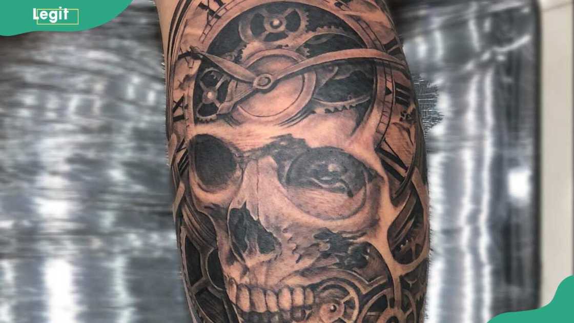 Ghost and clock tattoo