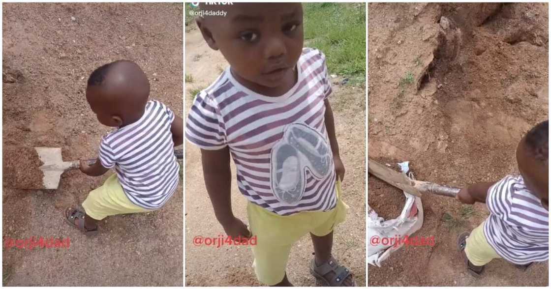 Orji, Little Nigerian boy, sack, fills sack with sand