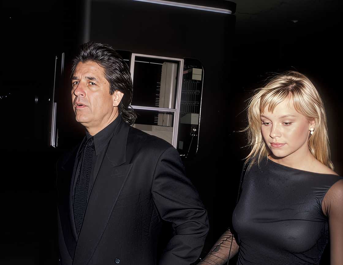 Producer Jon Peters and model Pamela Anderson attend a film premiere Producer Jon Peters and model Pamela Anderson attend a film premiere