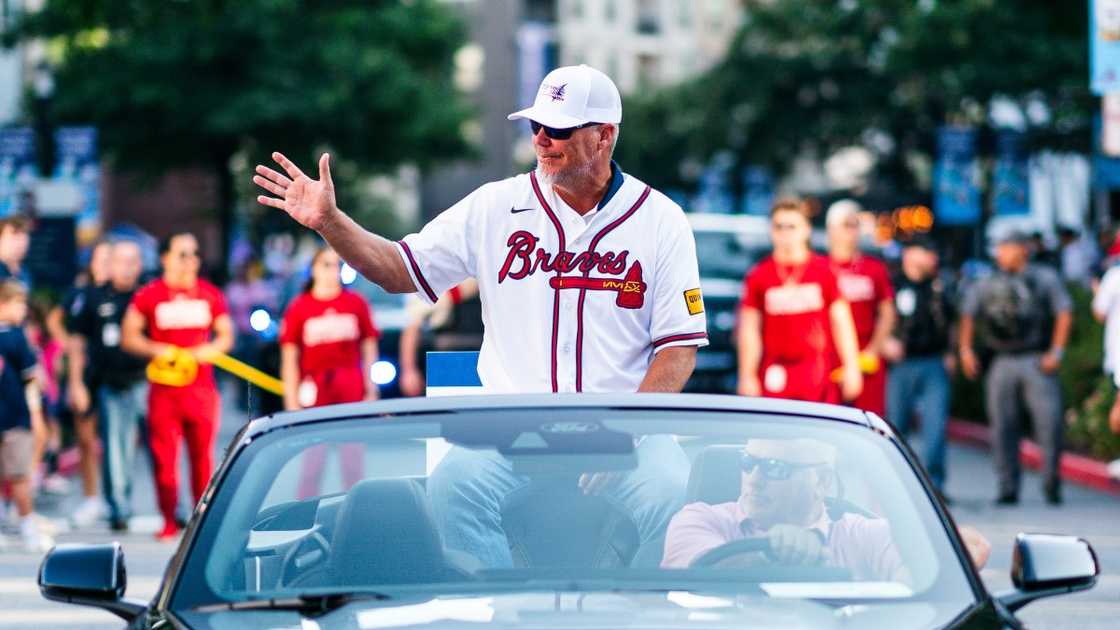 Chipper Jones waves to fans during the Atlanta Braves alumni weekend parade.