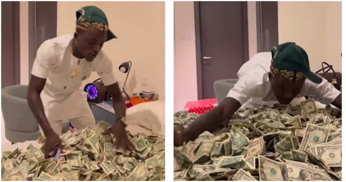 Zazu don cash out again: Portable says, shows off wads of foreign currency that takes an entire bed space Zazu don cash out again: Portable says, shows off wads of foreign currency that takes an entire bed space