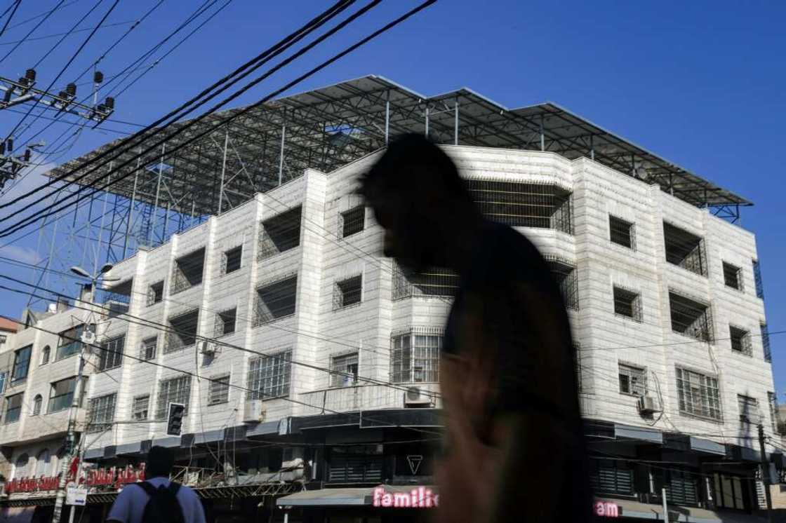 For most of Gaza's 2.3 million residents, power cuts are a daily occurrence, and many are turning to solar power, such as these panels on the roof of a bakery For most of Gaza's 2.3 million residents, power cuts are a daily occurrence, and many are turning to solar power, such as these panels on the roof of a bakery