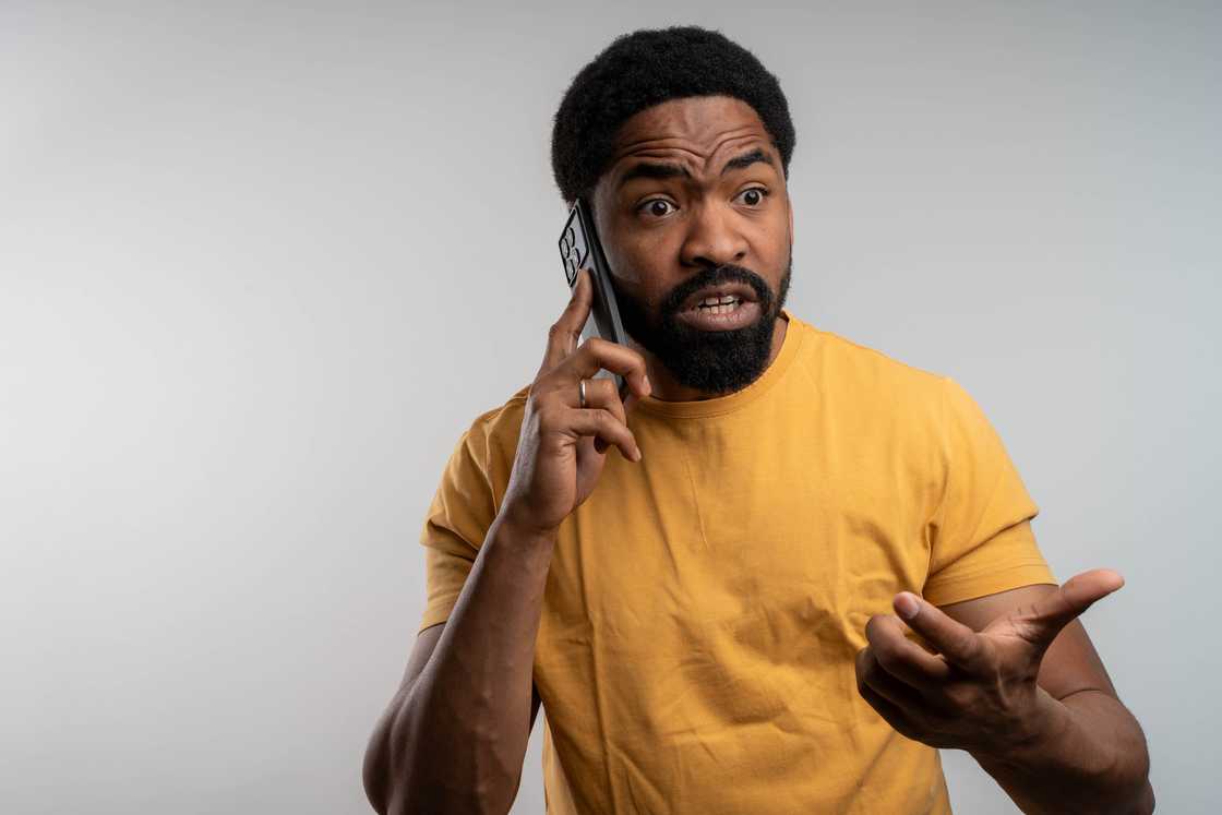 A man asking foor help over the phone
