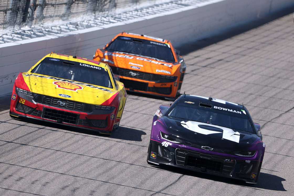 NASCAR cars racing at Kansas Speedway NASCAR cars racing at Kansas Speedway