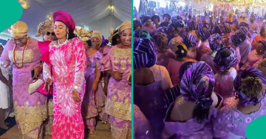 Nigerian mother flaunts her dances moves as she makes grand entrance into her daughter's wedding hall.