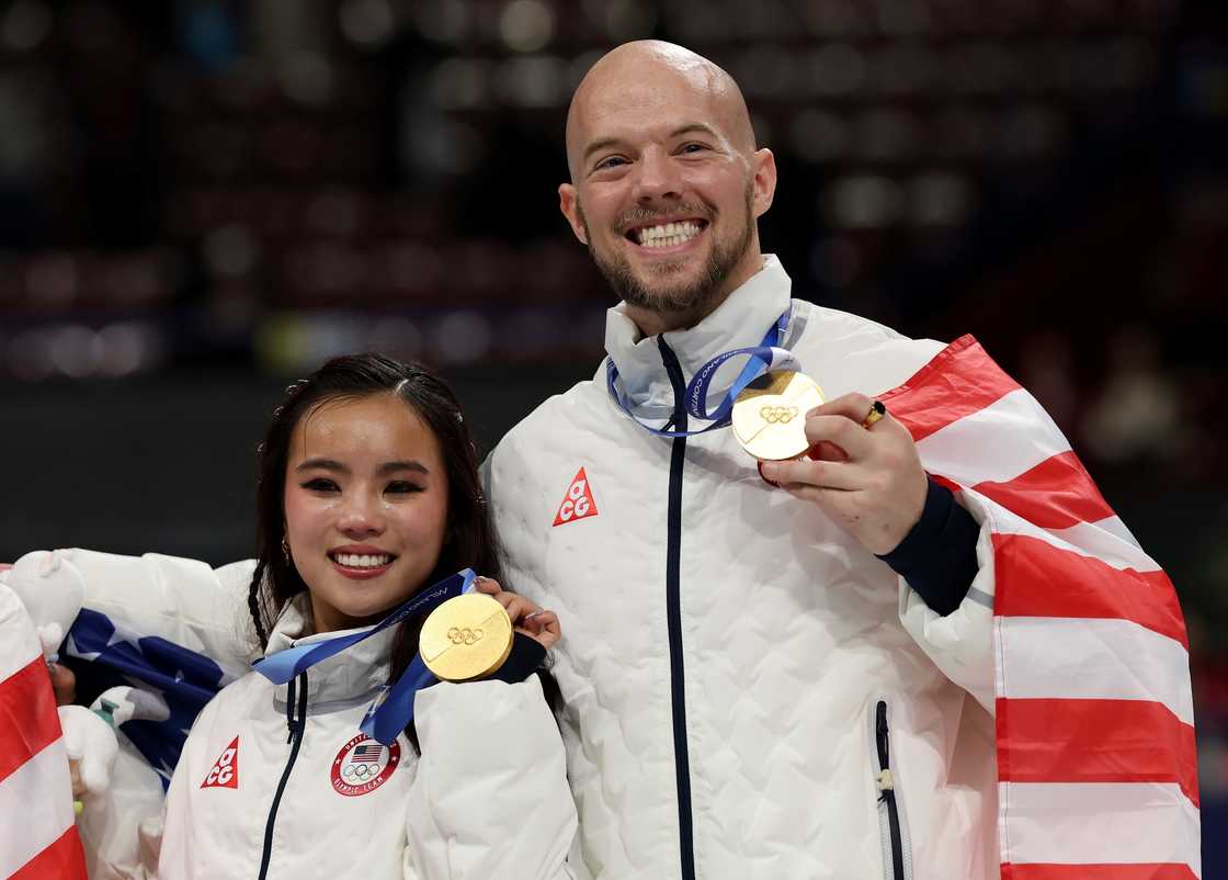 Ellie Kam and Danny O'Shea pose after the medal ceremony Ellie Kam and Danny O'Shea pose after the medal ceremony