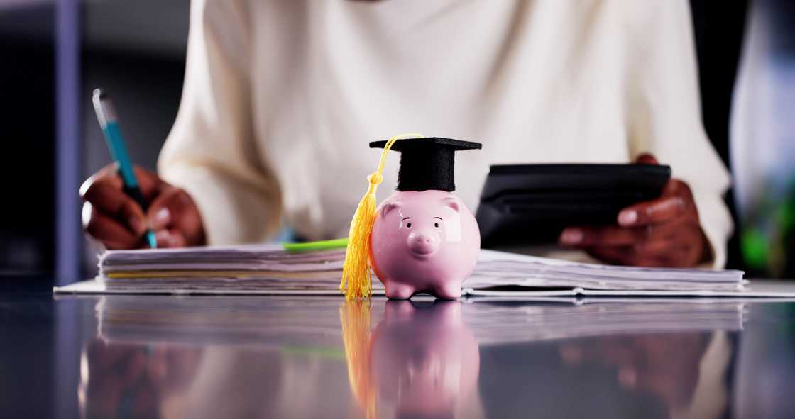 An accounting student doing some calculations