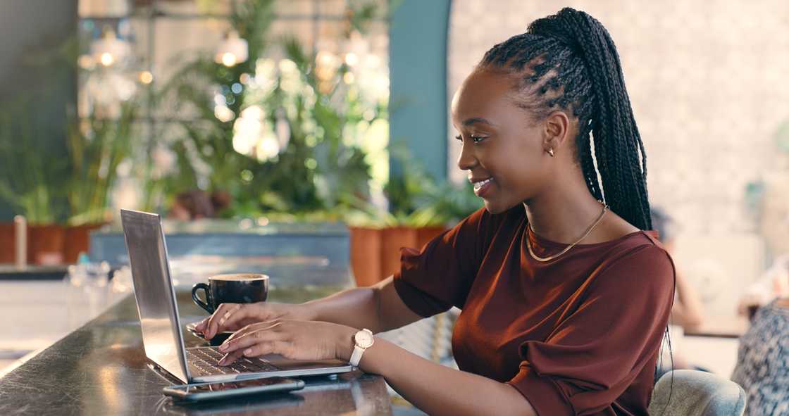 A lady on her laptop A lady on her laptop