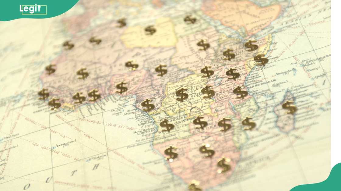 Africa dollar signs on the African map Africa dollar signs on the African map