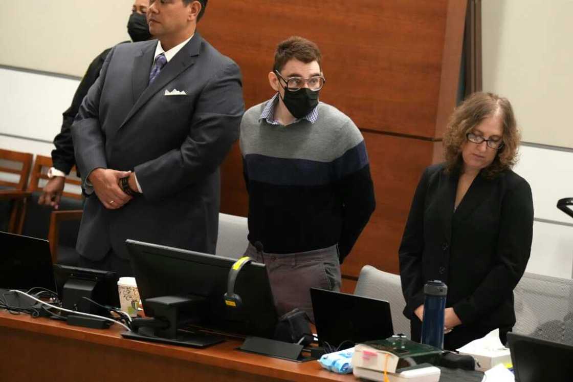 Nikolas Cruz (C), who pleaded guilty to 17 counts of murder for a 2018 shooting at Marjory Stoneman Douglas High School, stands as his sentencing trial opens in Florida Nikolas Cruz (C), who pleaded guilty to 17 counts of murder for a 2018 shooting at Marjory Stoneman Douglas High School, stands as his sentencing trial opens in Florida