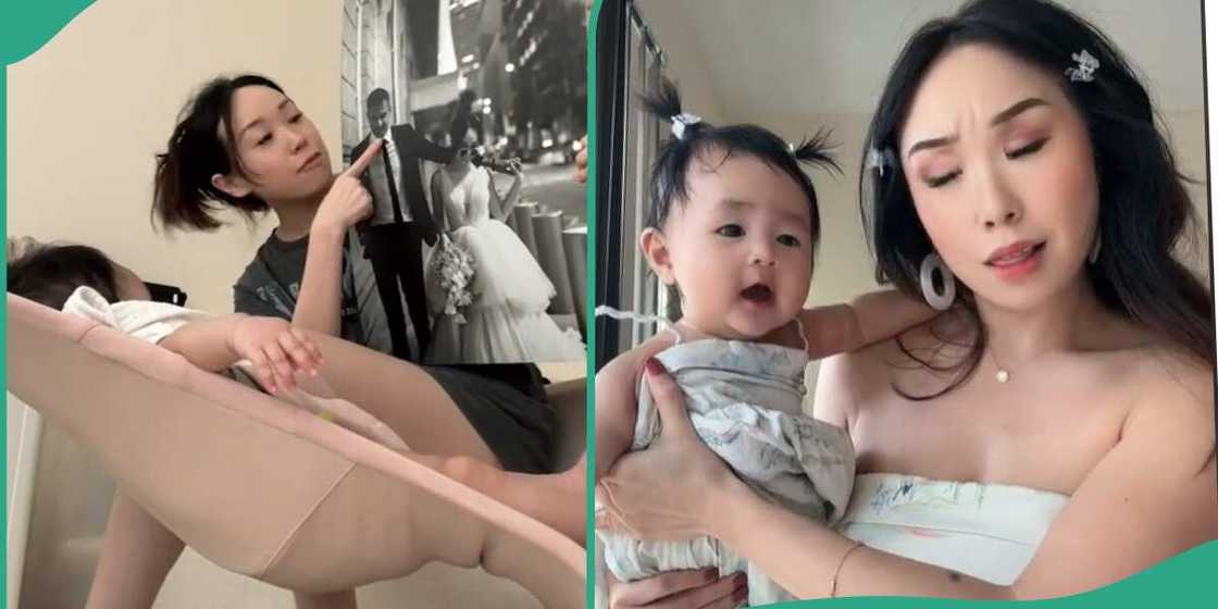 Woman teaches her daughter how to say 'mama' Woman teaches her daughter how to say 'mama'