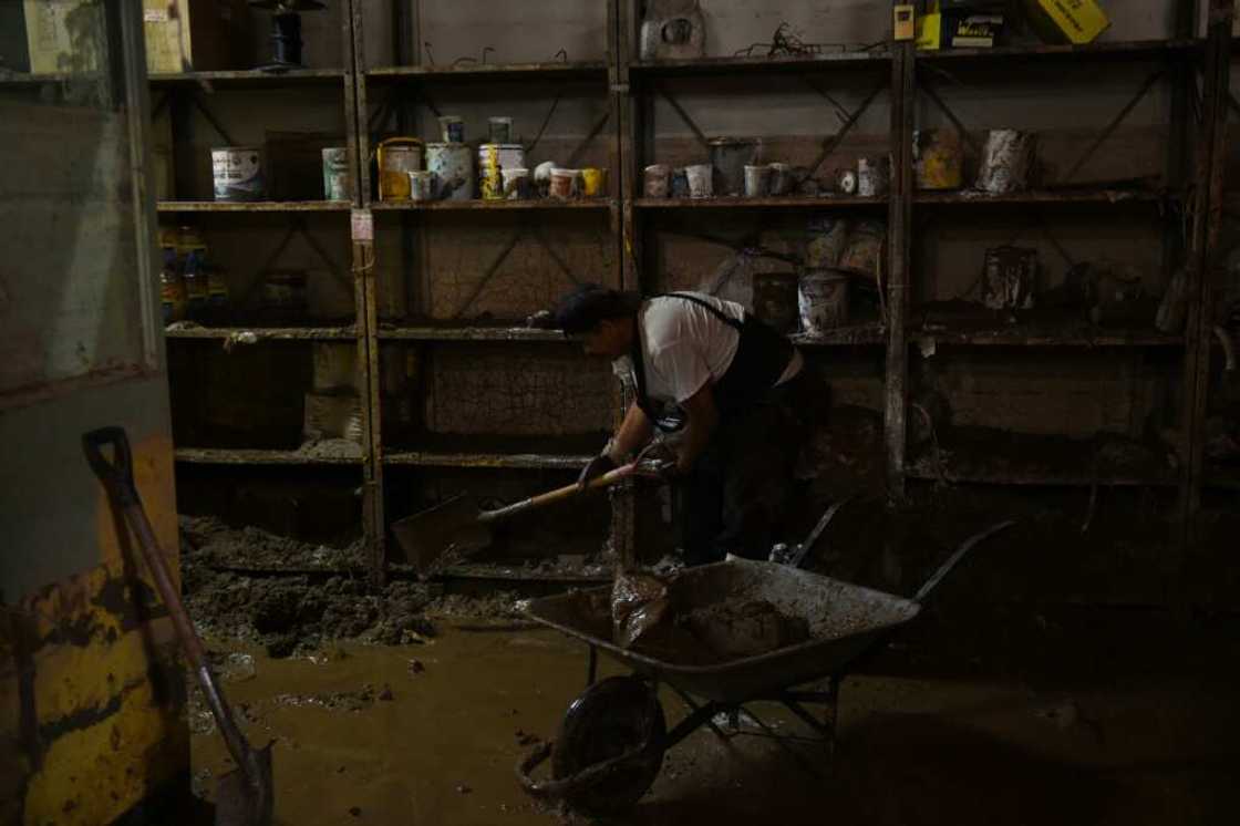 The mop-up operation continues for residents and shopkeepers The mop-up operation continues for residents and shopkeepers