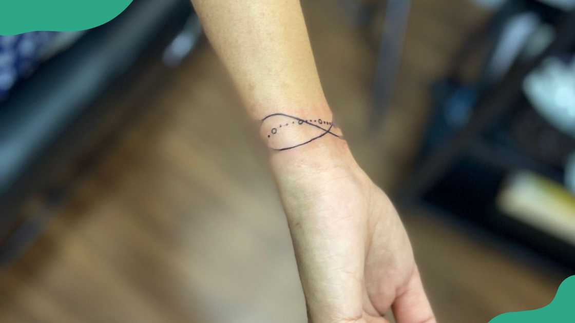 Infinity bracelet tattoo