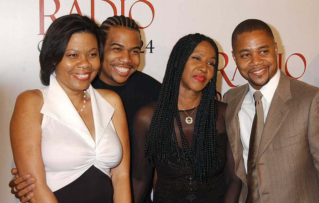 Shirley Gooding and her three children attend an event together Shirley Gooding and her three children attend an event together