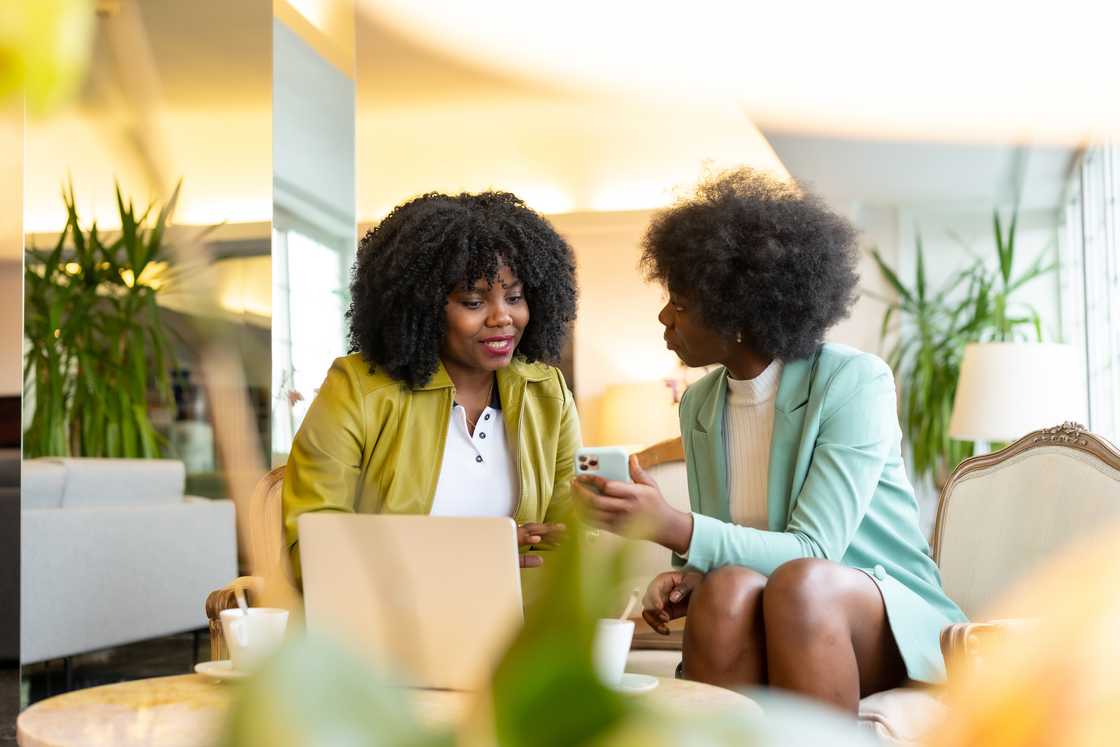 Two ladies at a cafe Two ladies at a cafe