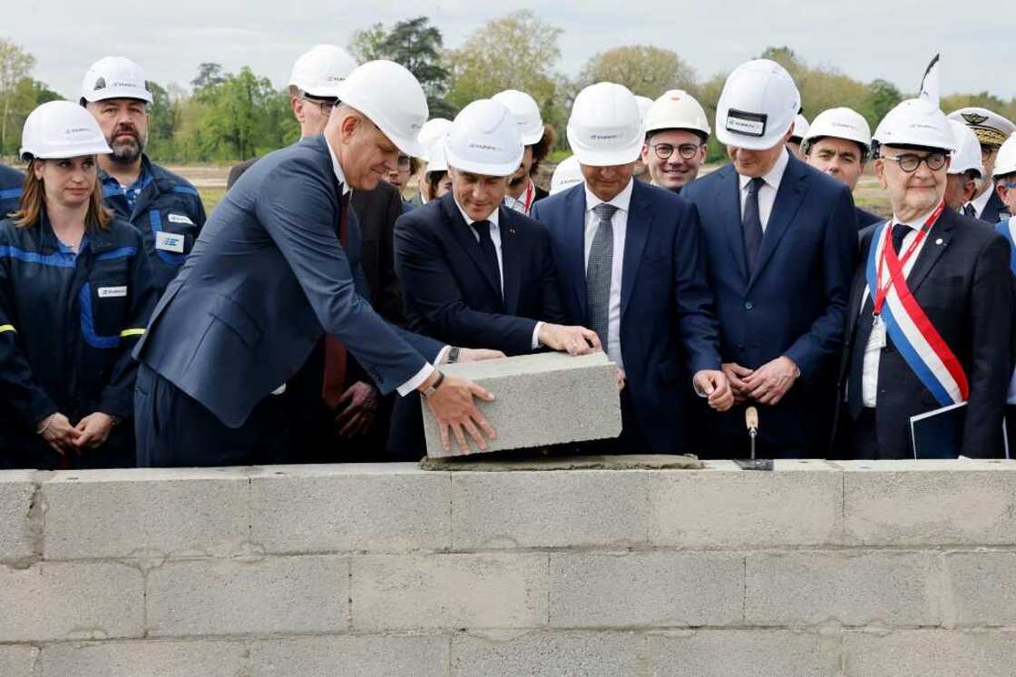 'Defence industries will play a growing role,' said French President Emmanuel Macron (centre) 'Defence industries will play a growing role,' said French President Emmanuel Macron (centre)