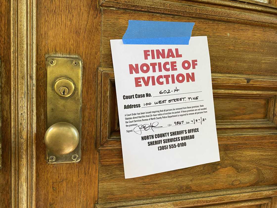 A final notice of eviction on the door.