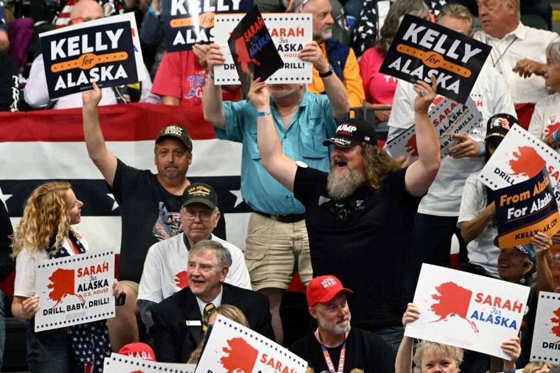 People attend a "Save America" rally by former US President Donald Trump in support of House of Representative candidate Sarah Palin, in Anchorage, Alaska on July 9, 2022. People attend a "Save America" rally by former US President Donald Trump in support of House of Representative candidate Sarah Palin, in Anchorage, Alaska on July 9, 2022.