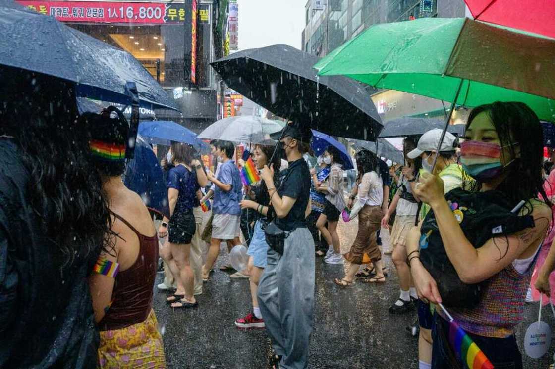 Pouring rain did not stop thousands of Pride attendees from marching in Seoul Pouring rain did not stop thousands of Pride attendees from marching in Seoul