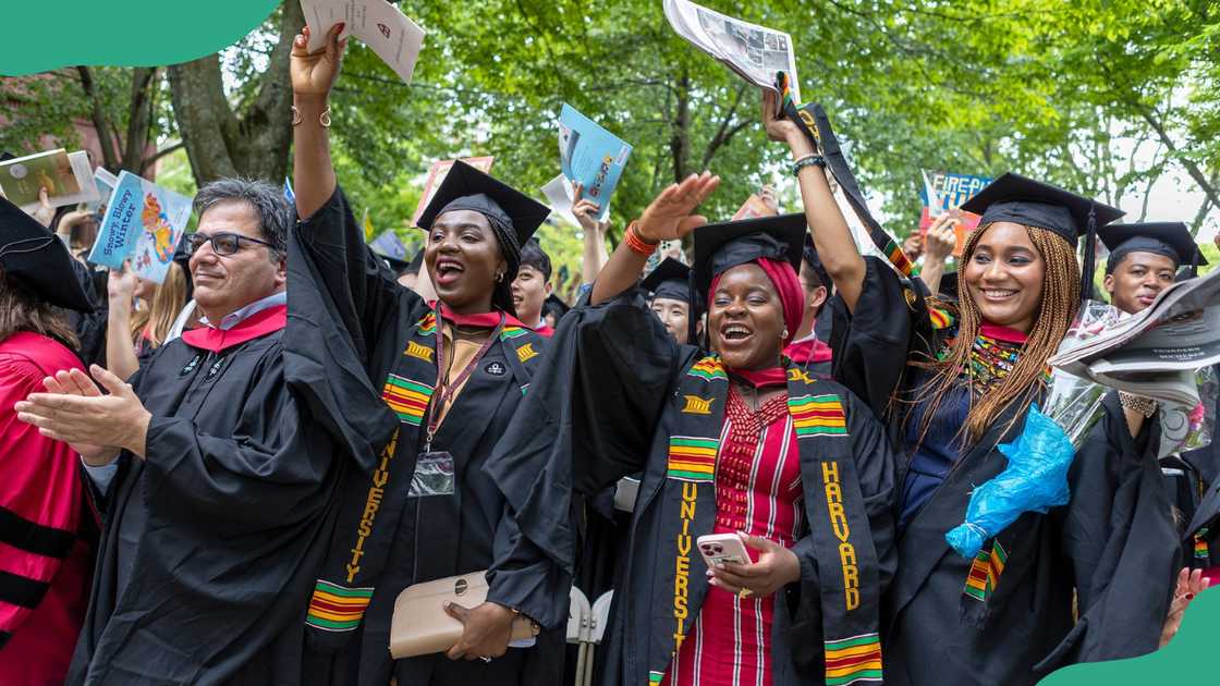 Harvard University graduates celebrating. Harvard University graduates celebrating.