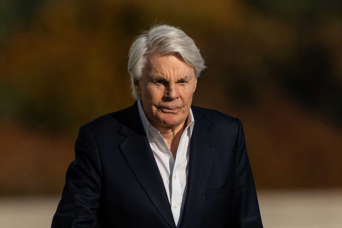 Former Abercrombie and Fitch CEO Mike Jeffries walks out of federal court after his arraignment in Central Islip, New York on October 25, 2024