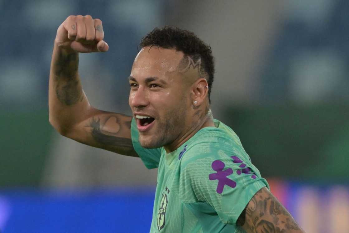 Brazil's forward Neymar gestures during a training session