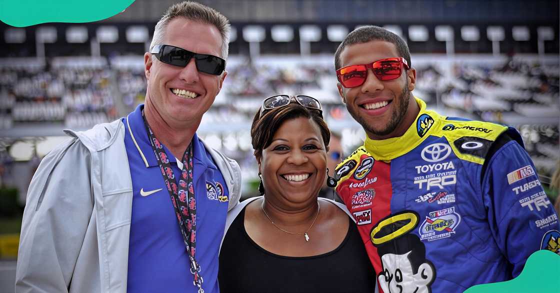 Darrell Wallace Sr., Desiree Wallace, and Bubba Wallace pose together after a NASCAR race. Darrell Wallace Sr., Desiree Wallace, and Bubba Wallace pose together after a NASCAR race.