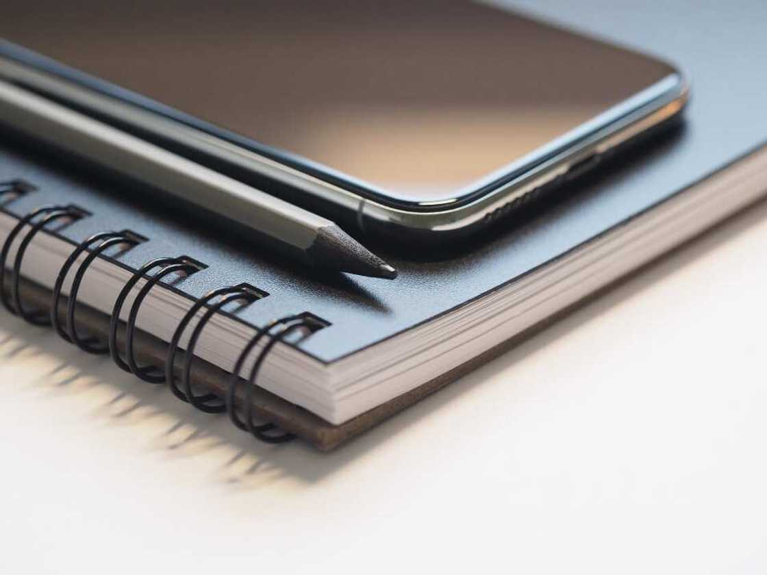 Notebook pencil and phone Notebook pencil and phone