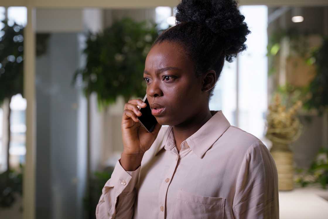 African American businesswoman talking on a phone African American businesswoman talking on a phone